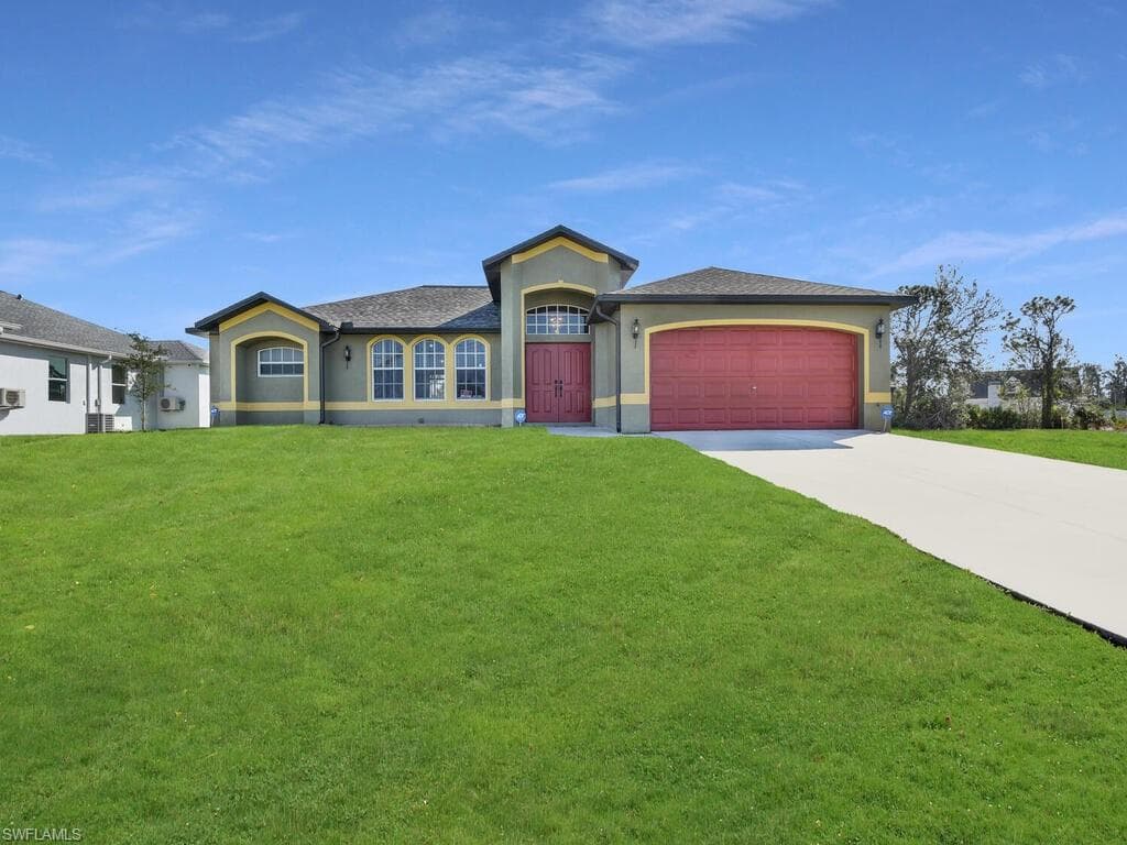 209 SW 10th AVE CAPE CORAL, FL 33991