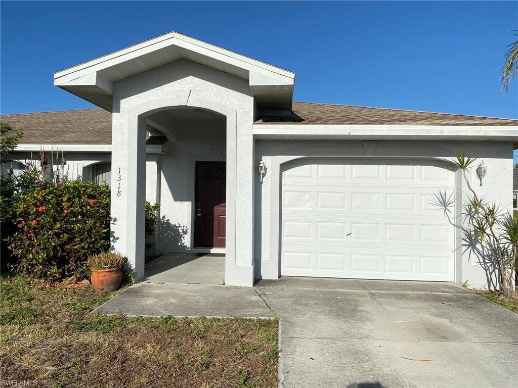 1318 Country Club BLVD CAPE CORAL, FL 33990