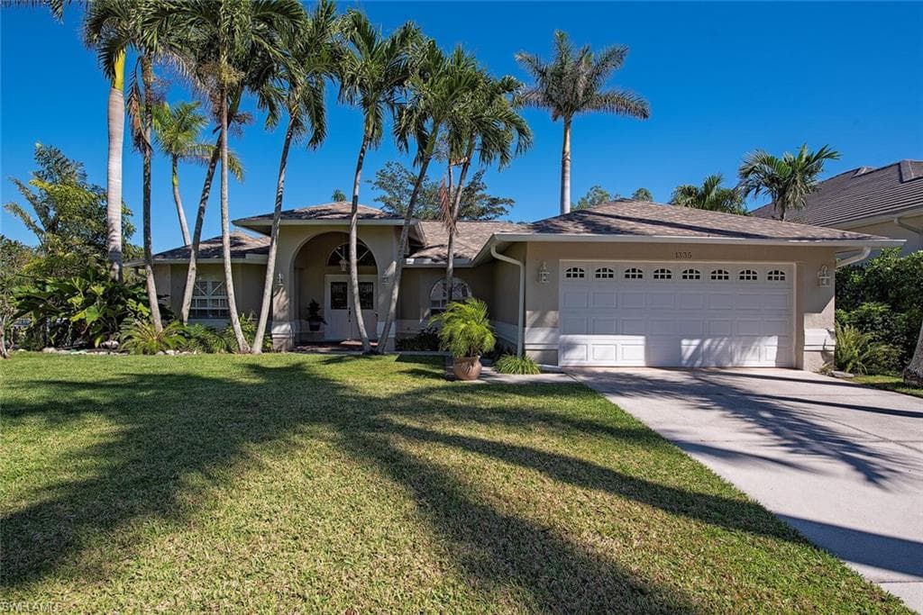 1335 Cypress Woods DR NAPLES, FL 34103