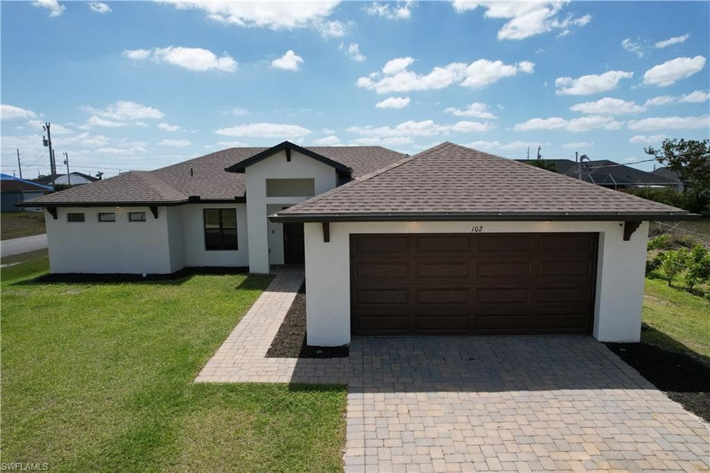 102 NW 9th TER CAPE CORAL, FL 33993