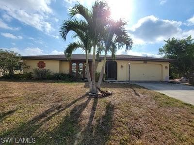 411 SE 20th CT CAPE CORAL, FL 33990