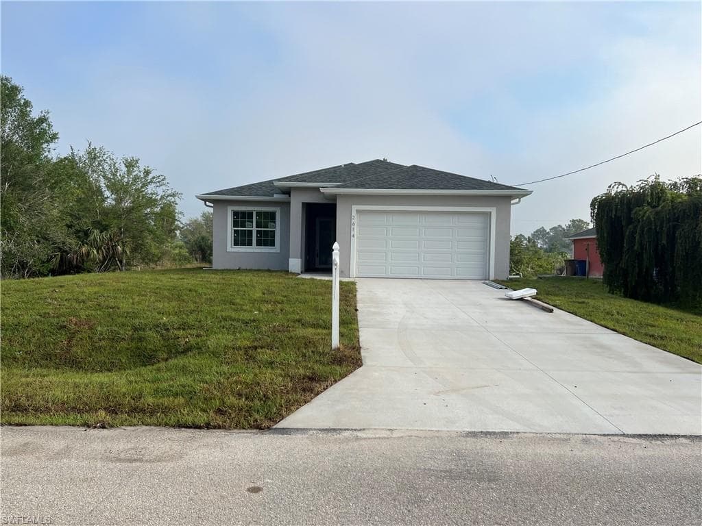 2614 25th St ST W LEHIGH ACRES, FL 33971