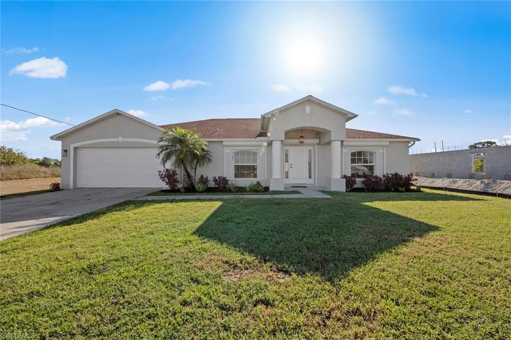 319 Rawlings AVE LEHIGH ACRES, FL 33974