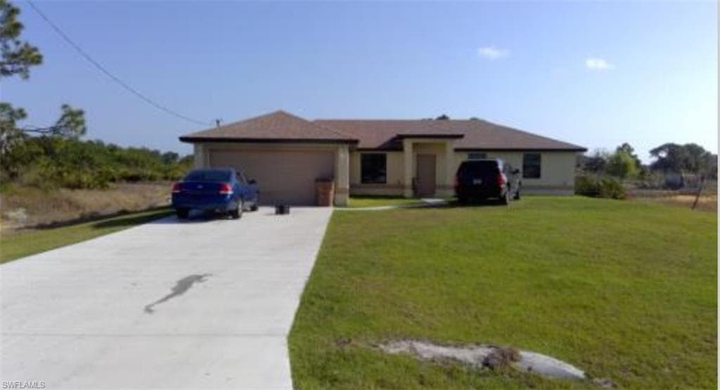 77 Milwaukee BLVD LEHIGH ACRES, FL 33974
