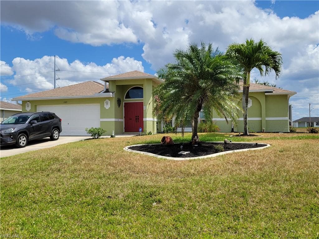 1323 NW Juanita PL CAPE CORAL, FL 33993