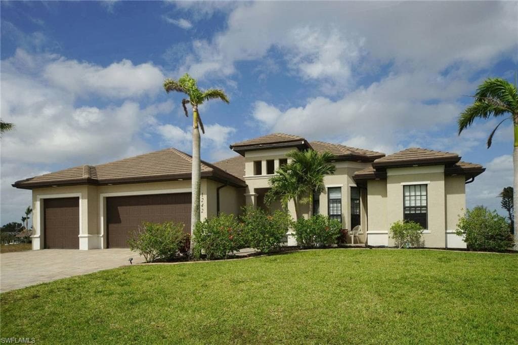 1242 NW 36th AVE CAPE CORAL, FL 33993