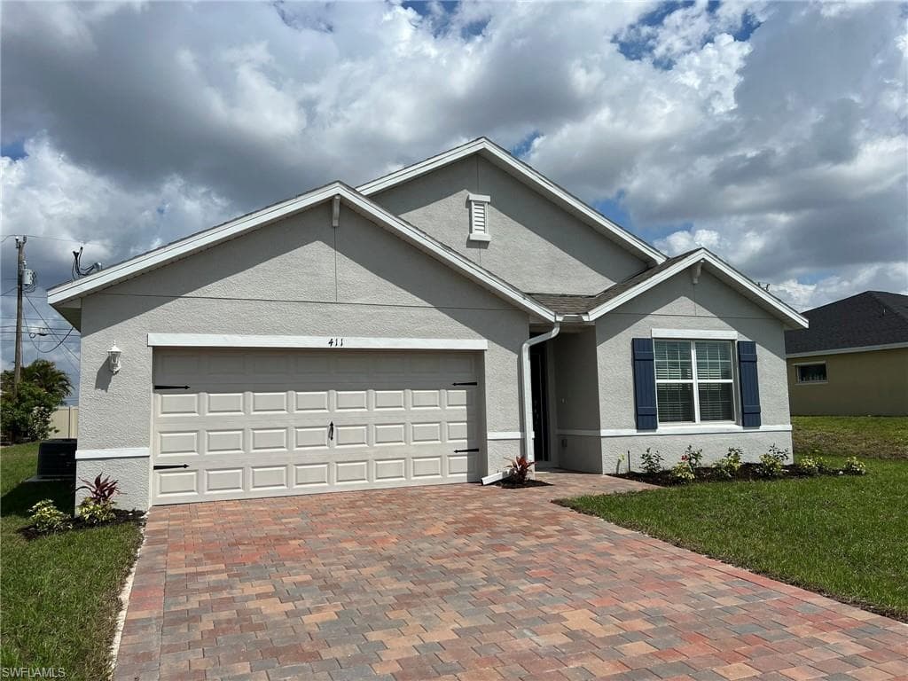 411 NW 7th TER CAPE CORAL, FL 33993