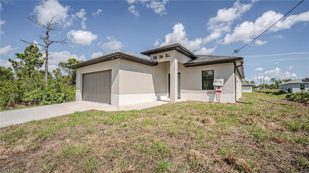 2606 19th ST W LEHIGH ACRES, FL 33971
