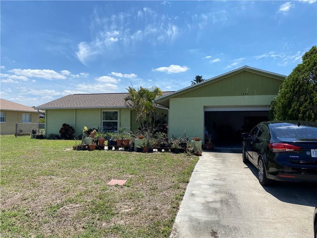 1404 SE 11th TER CAPE CORAL, FL 33990