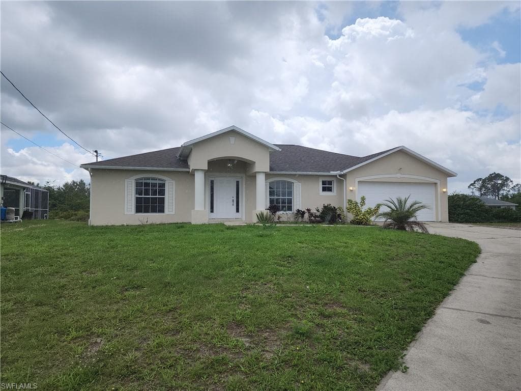 3213 14th ST W LEHIGH ACRES, FL 33971