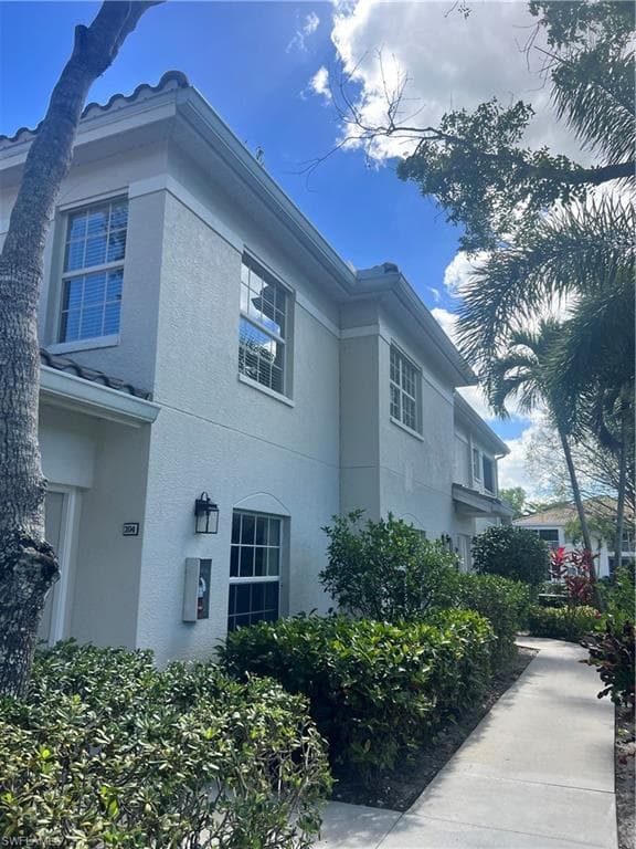 6922 Satinleaf RD N 104 NAPLES, FL 34109
