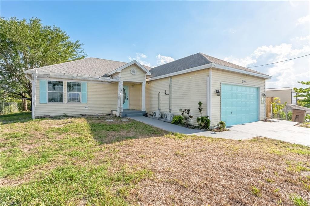 2703 21st ST SW LEHIGH ACRES, FL 33976