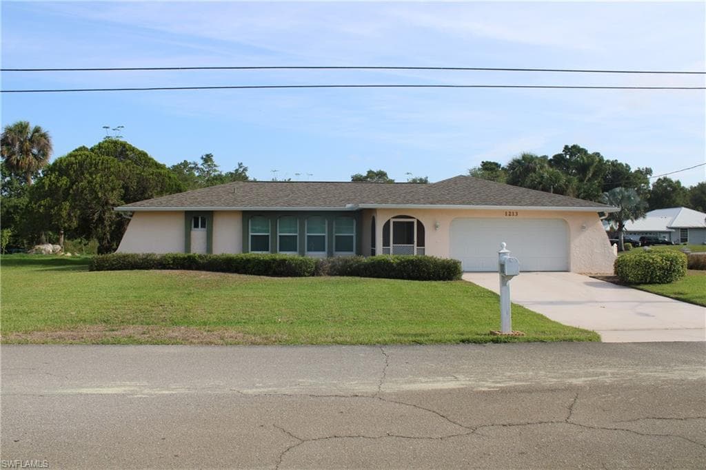 1213 E 3rd ST LEHIGH ACRES, FL 33936