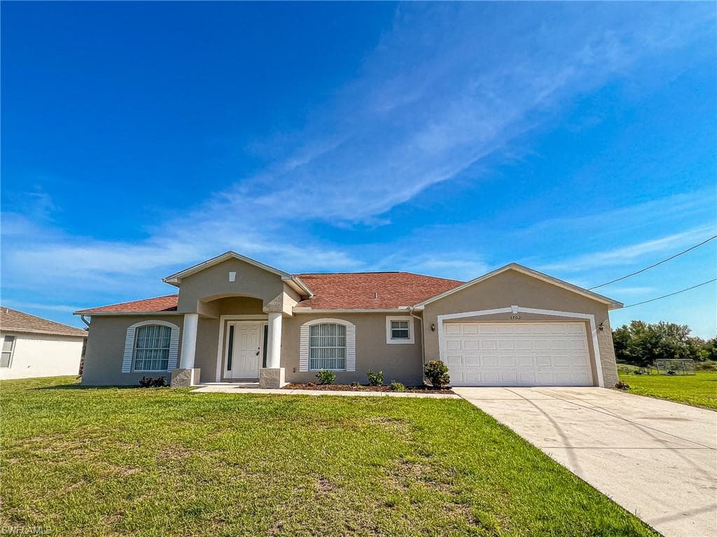 3702 26th ST SW LEHIGH ACRES, FL 33976