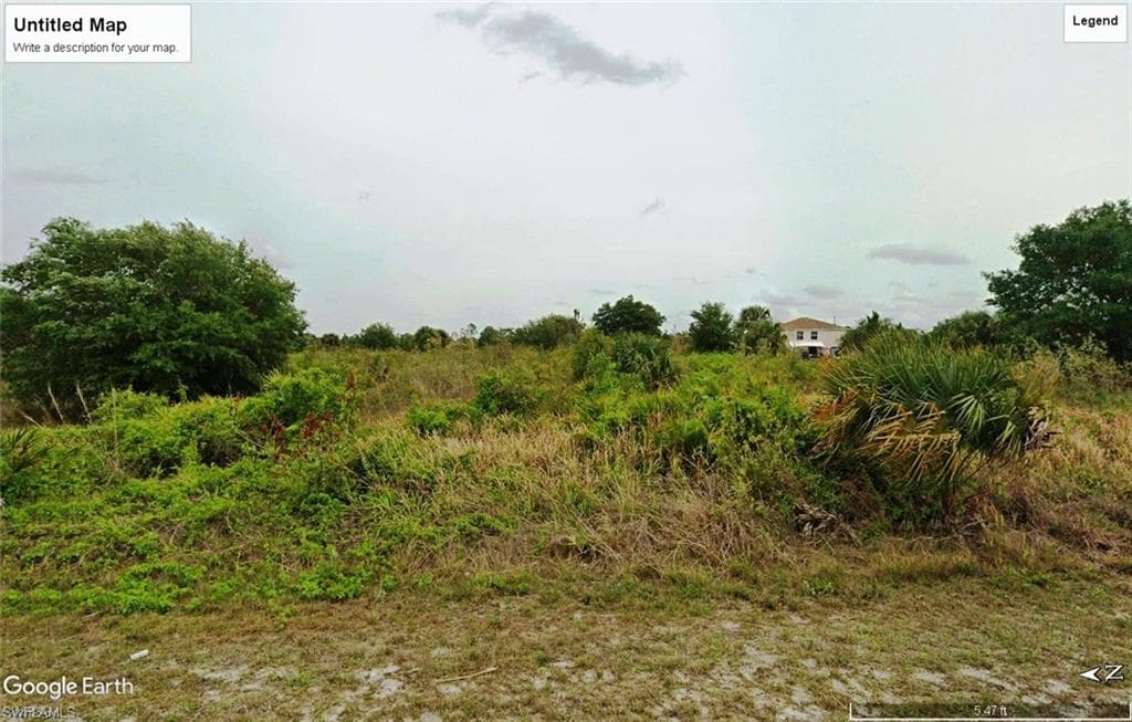 909 Maple AVE N LEHIGH ACRES, FL 33972