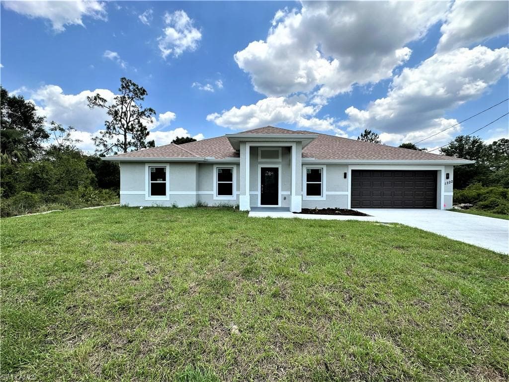 1302 Greenwood AVE LEHIGH ACRES, FL 33972