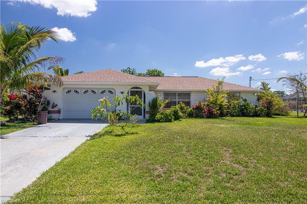 518 McArthur AVE LEHIGH ACRES, FL 33936