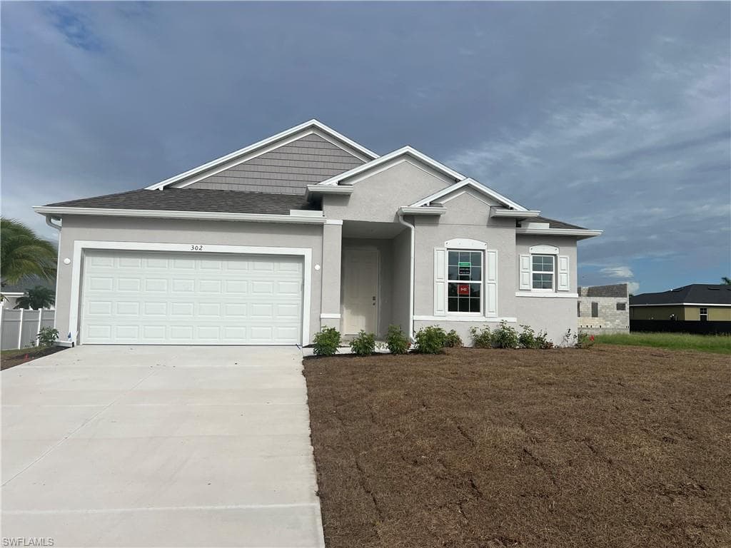 302 NW 25th PL CAPE CORAL, FL 33993