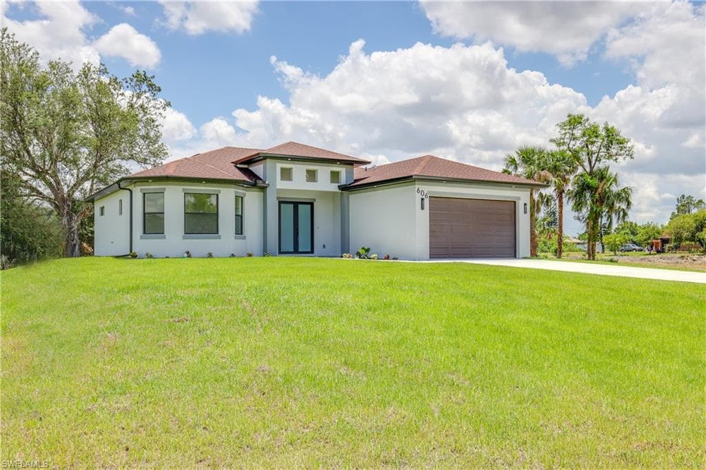 606 Harrison DR LEHIGH ACRES, FL 33936