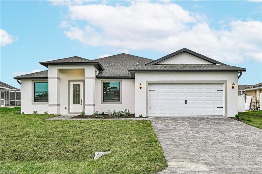 911 SW 31st TER CAPE CORAL, FL 33914