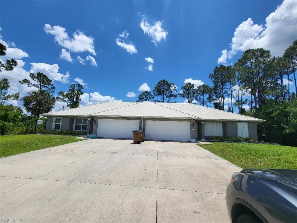 387 Carrillon AVE S LEHIGH ACRES, FL 33974