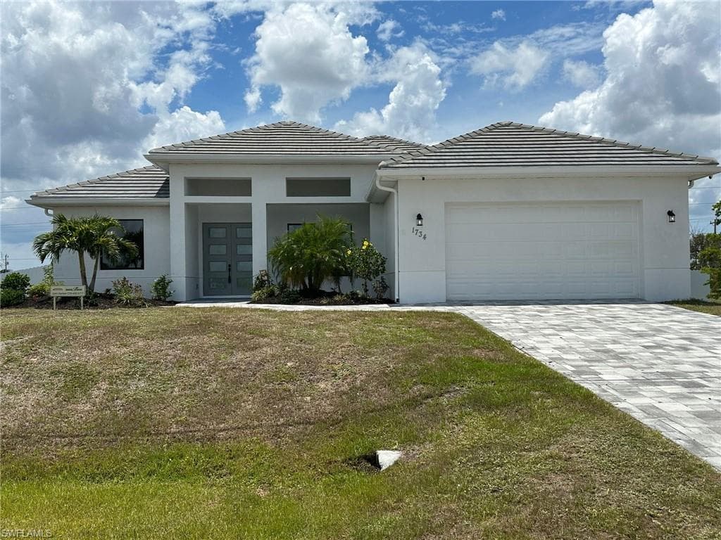 1734 24th AVE CAPE CORAL, FL 33993