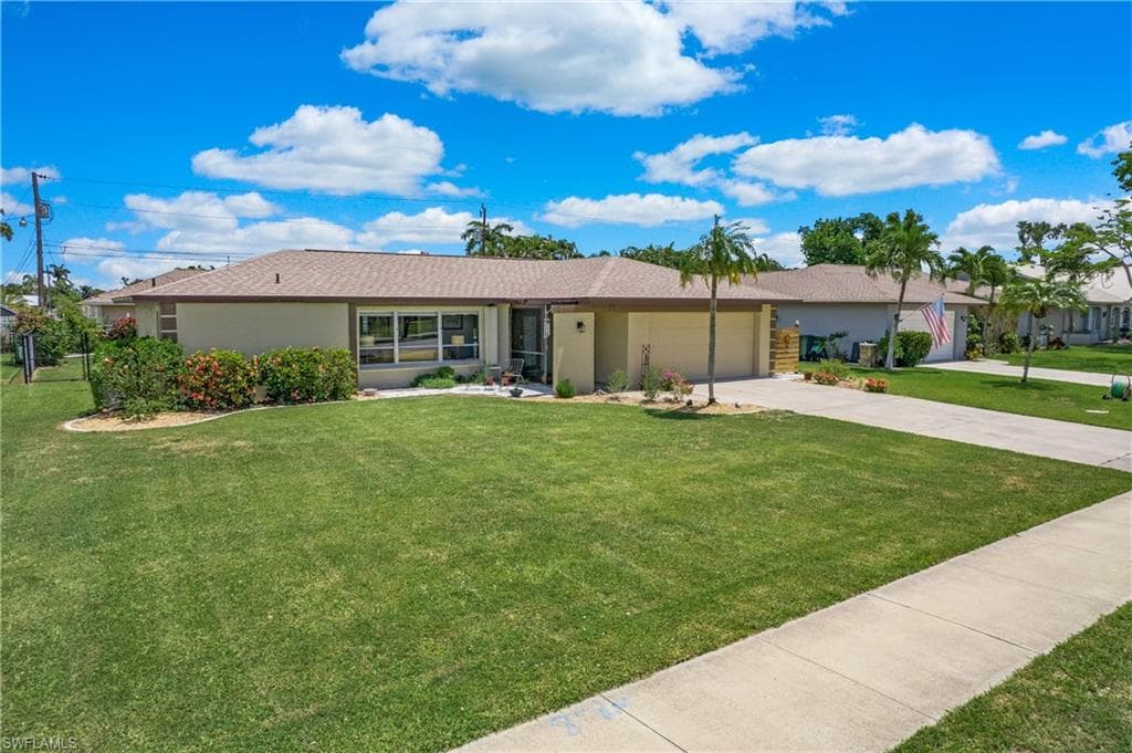 517 Wildwood PKWY CAPE CORAL, FL 33904