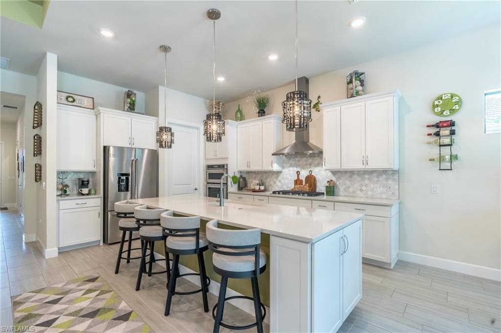 6898 Winding Cypress DR NAPLES, FL 34114