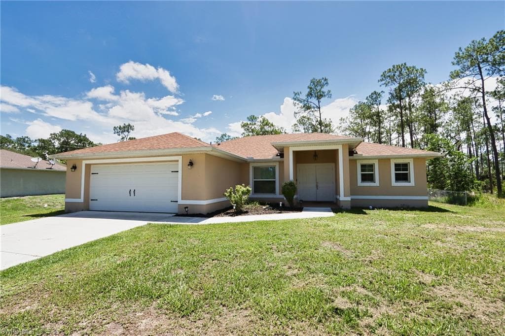 712 Johns AVE LEHIGH ACRES, FL 33972