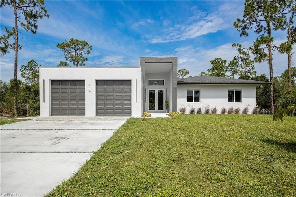 319 Columbus AVE LEHIGH ACRES, FL 33936