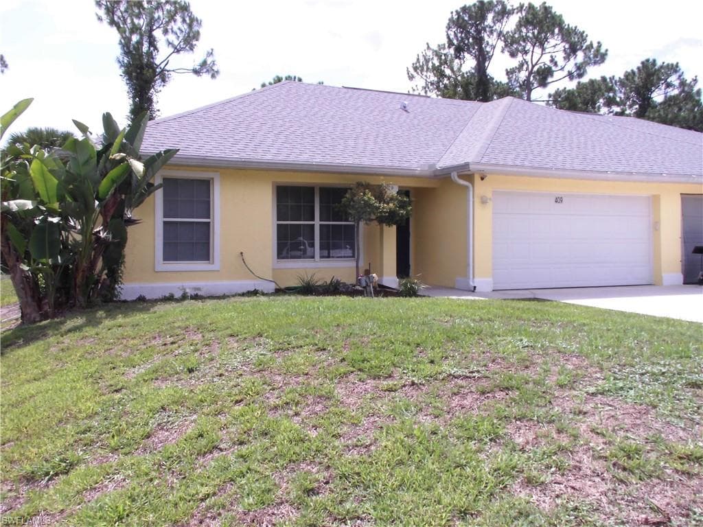 409 Chalet AVE S LEHIGH ACRES, FL 33974