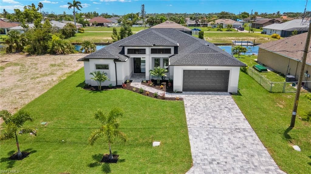 613 11th CT CAPE CORAL, FL 33991