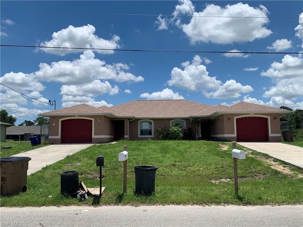 121-123 Ivan AVE S LEHIGH ACRES, FL 33973