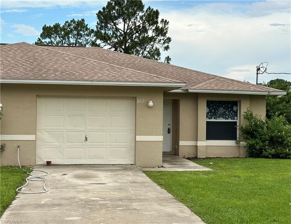 852 Holmes AVE LEHIGH ACRES, FL 33974
