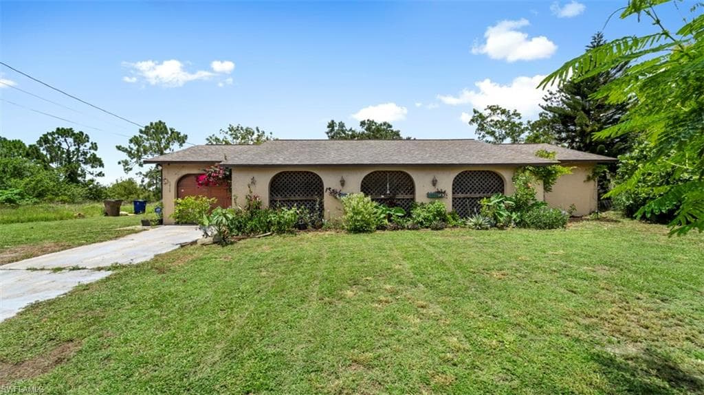 1046 Minerva AVE S LEHIGH ACRES, FL 33974