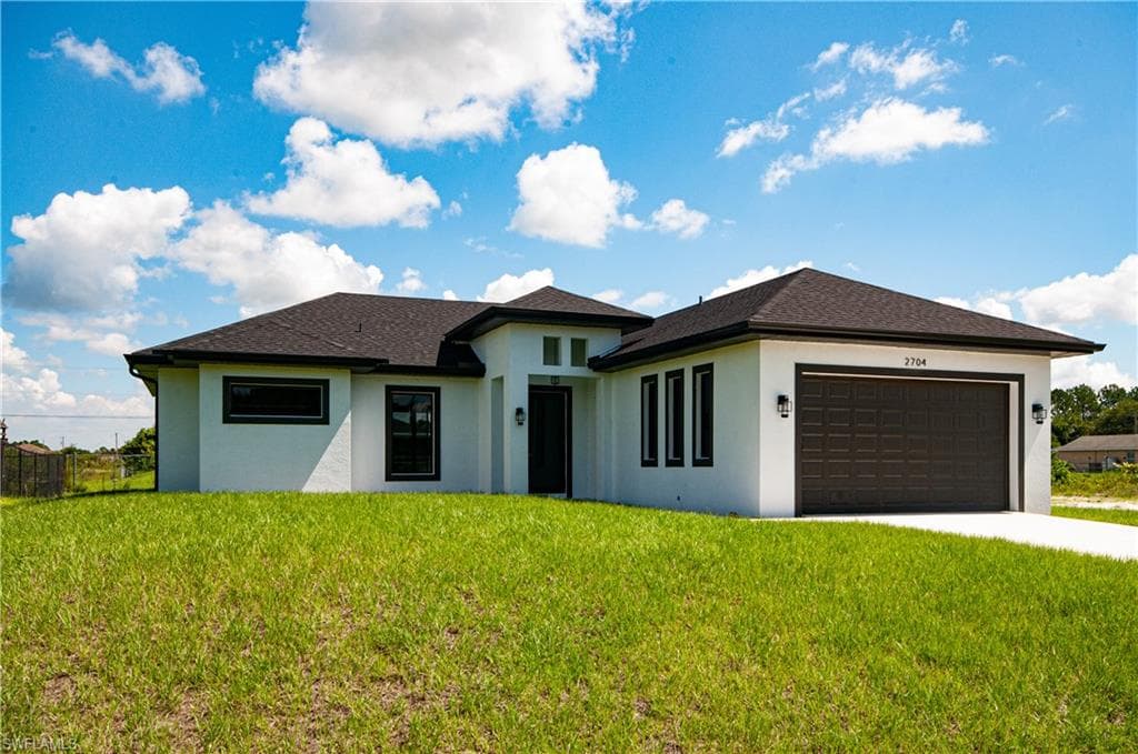 2704 34th ST SW LEHIGH ACRES, FL 33976