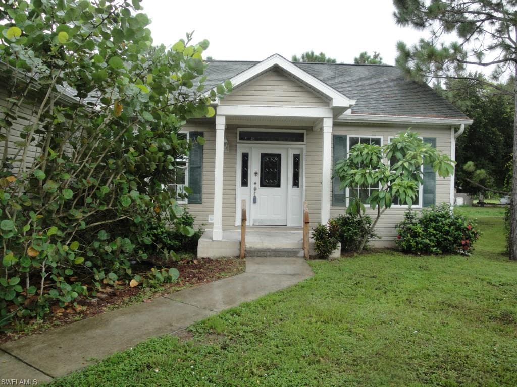 302 Harry AVE N LEHIGH ACRES, FL 33971