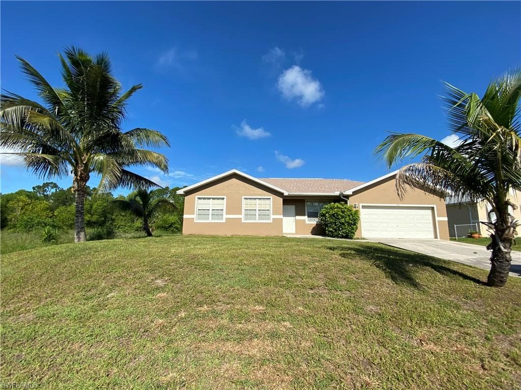 103 Eric AVE N LEHIGH ACRES, FL 33971