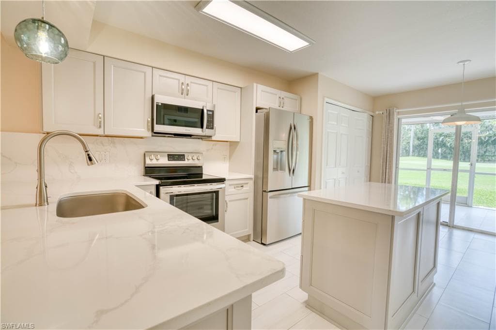 9700 Rosewood Pointe CT 102 BONITA SPRINGS, FL 34135
