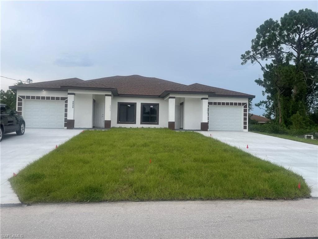 709-711 Harry AVE S LEHIGH ACRES, FL 33973