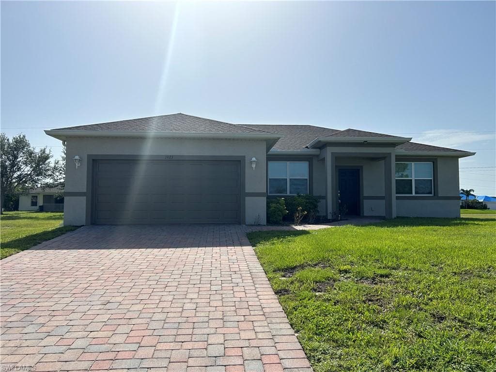 1423 NW 1st AVE CAPE CORAL, FL 33993