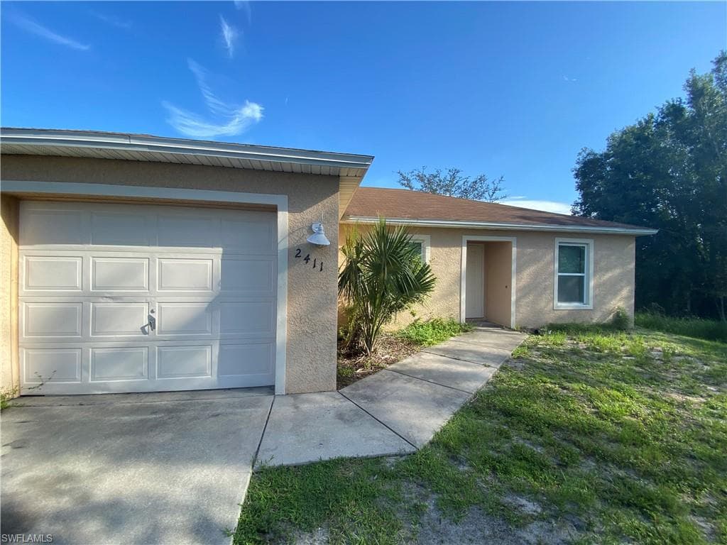 2409-2411 Park RD LEHIGH ACRES, FL 33971