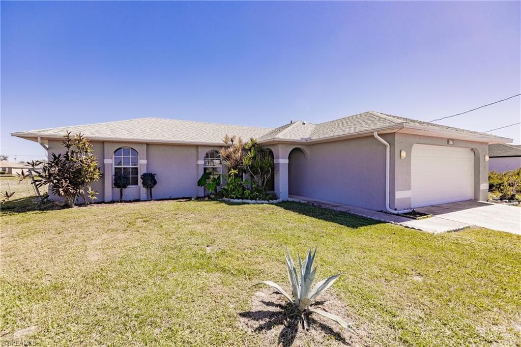 409 NW 18th PL CAPE CORAL, FL 33993