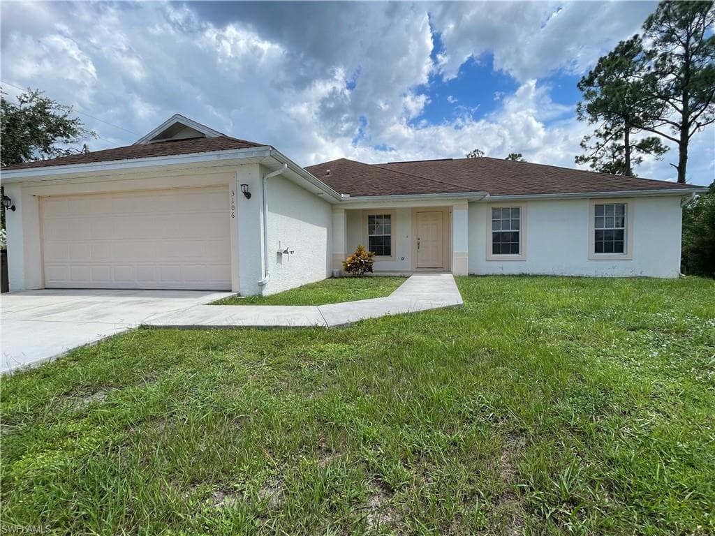 3106 E 10th ST LEHIGH ACRES, FL 33972