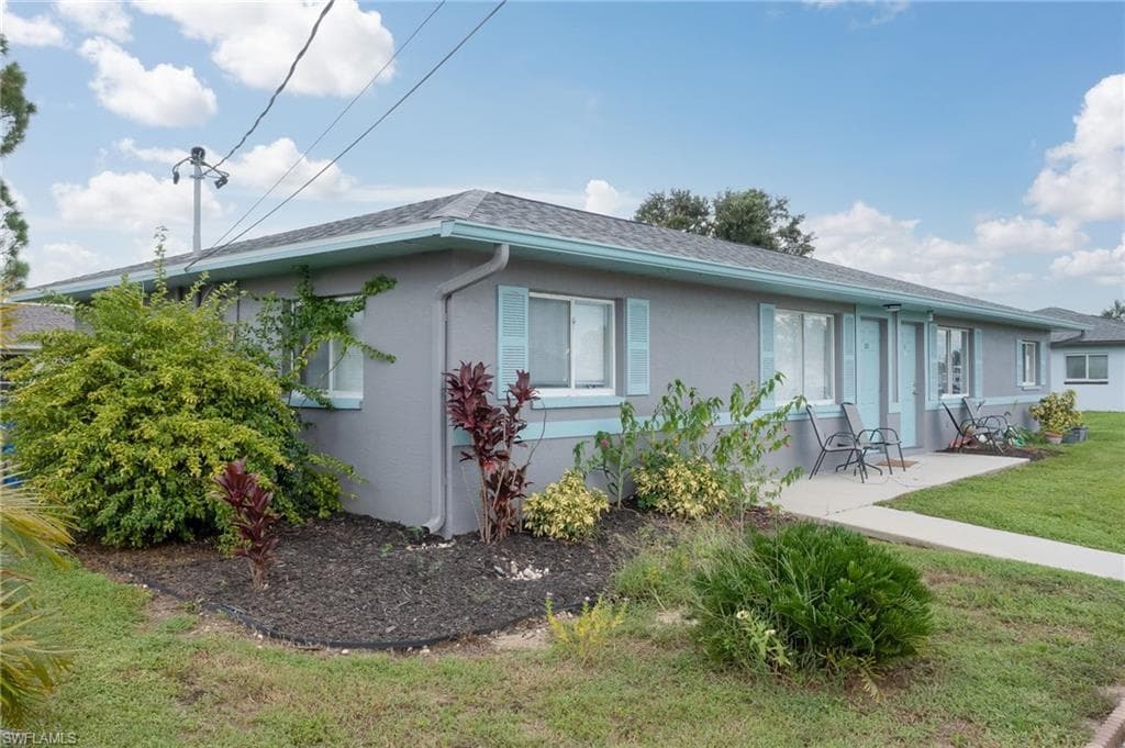 125/127 Gordon AVE S LEHIGH ACRES, FL 33973