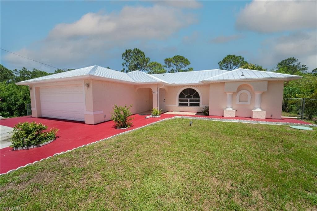 521 Empire AVE S LEHIGH ACRES, FL 33974