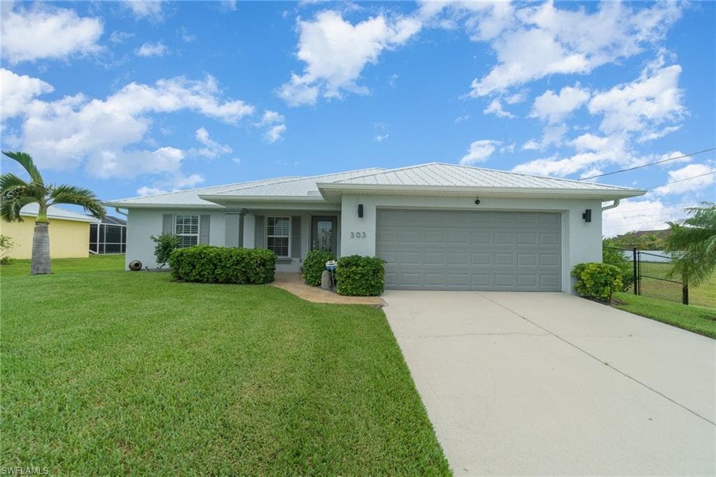 303 NW 24th PL CAPE CORAL, FL 33993