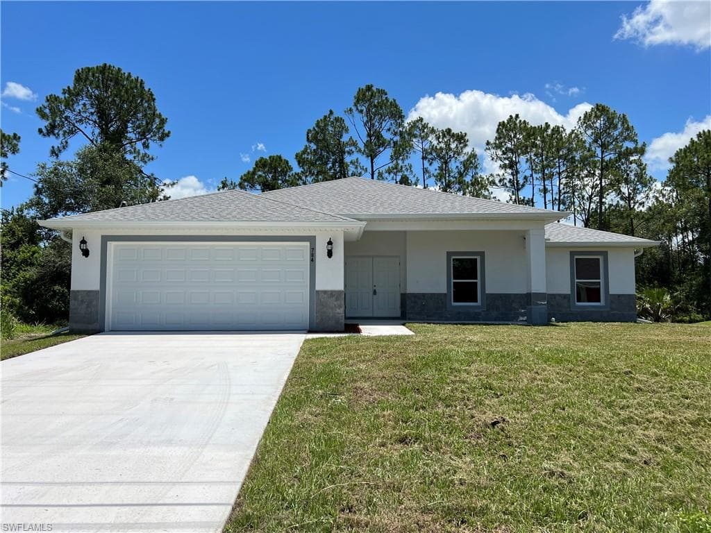 704 Roosevelt AVE LEHIGH ACRES, FL 33936
