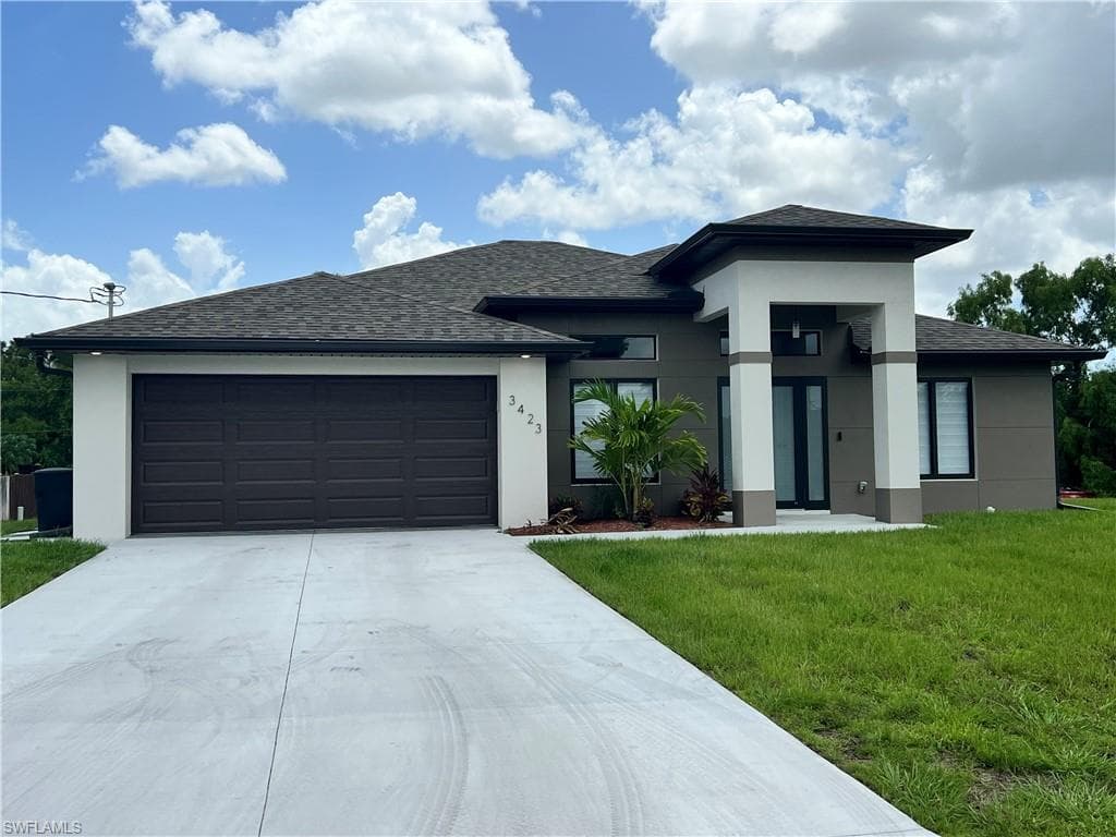 506 Maple AVE N LEHIGH ACRES, FL 33972