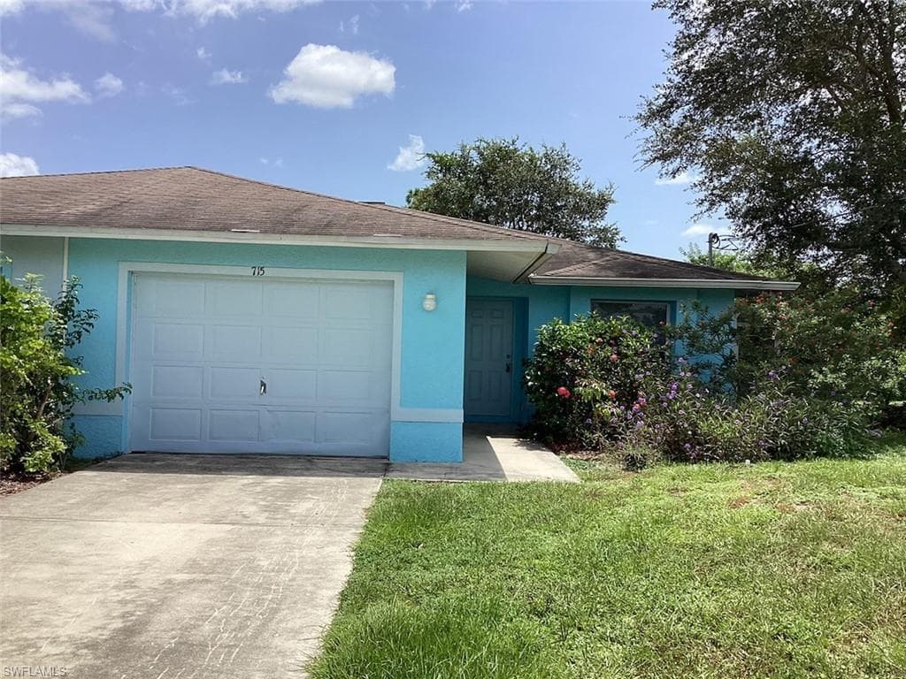 715 Jenna AVE S LEHIGH ACRES, FL 33973
